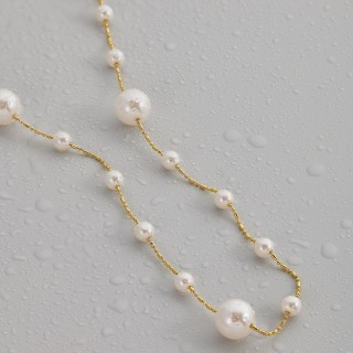 Подвеска длинная с жемчугом в золоте