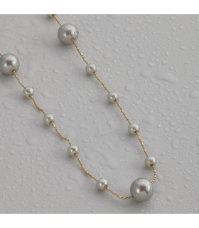 Подвеска длинная с жемчугом в бронзе